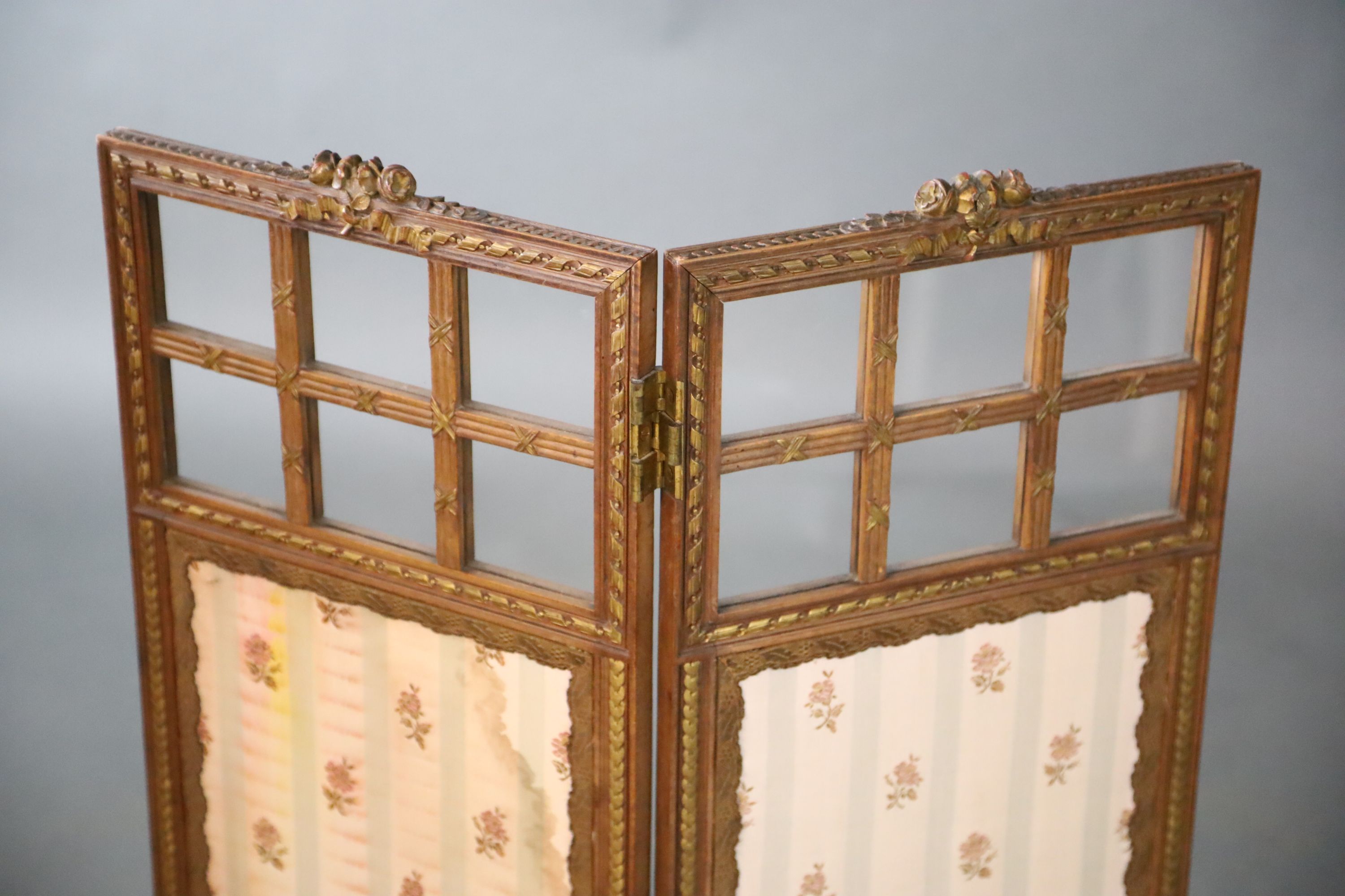 An Edwardian parcel gilt walnut dwarf two fold screen, W.35.5cm H.96.5cm